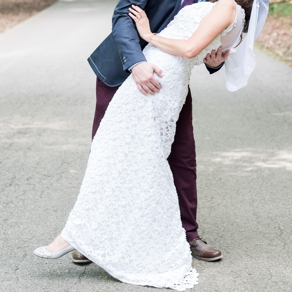 Timeless white lace wedding dress